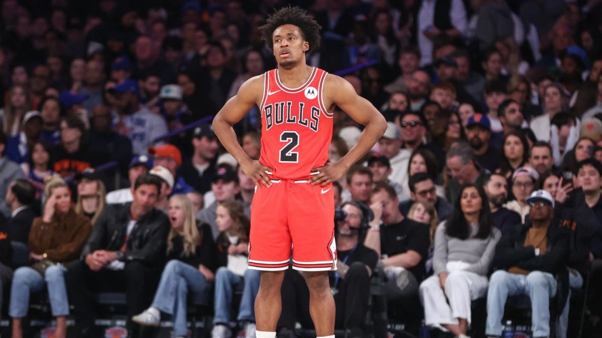 Collin Sexton, in a red Chicago Bulls No. 2 jersey, stands with his hands on his hips during a game.